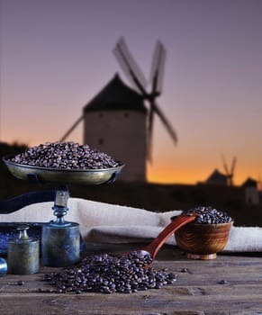 Coffee with scale and coffee beans bag in background.