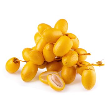 yellow raw date palm isolated over white background.