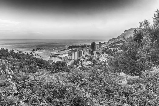 Panoramic view of Monaco at sunset from the Grande Corniche road, iconic landmark in Cote d'Azur, French Riviera