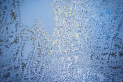 Frosty natural pattern on winter window
