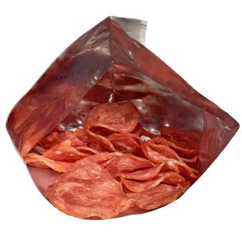 Meat stuffed chips in packaging close up isolated on a white background.