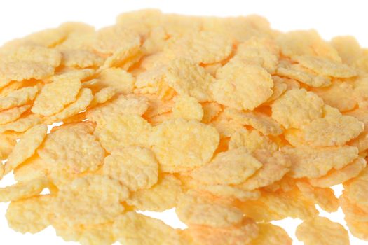 Cornflakes close up isolated on white background.