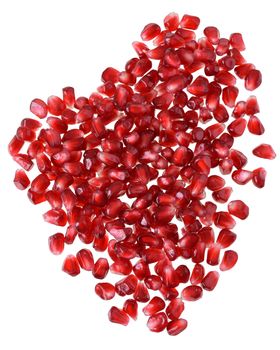 Cut the pomegranate with scattered grain top view isolated on white background.