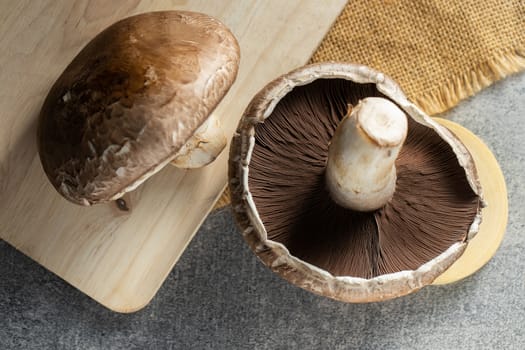 Fresh Portobello Mushroom on wooden board