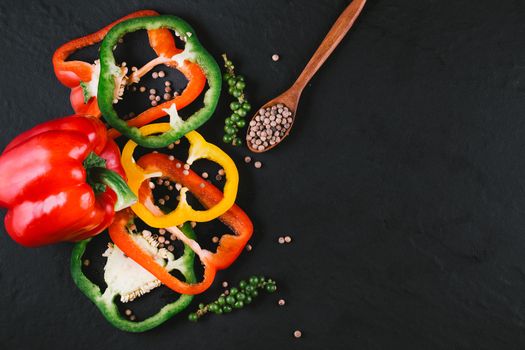 Three sweet peppers on a wooden background, Cooking vegetable salad