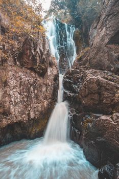 Waterfall colorful leaves in the summer is a beautiful waterfall with clear