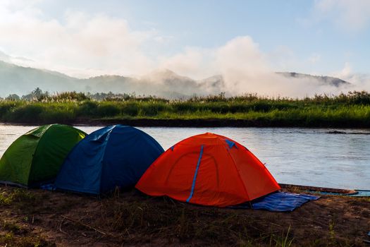 tourist tent camping in mountains