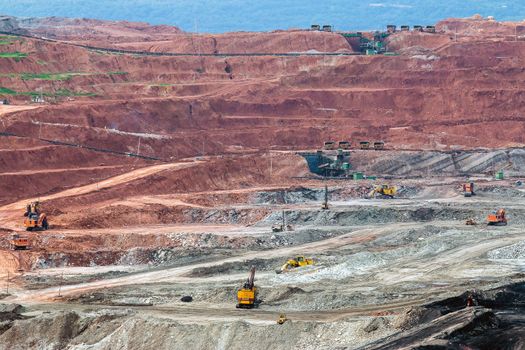 Part of a pit with big mining truck working