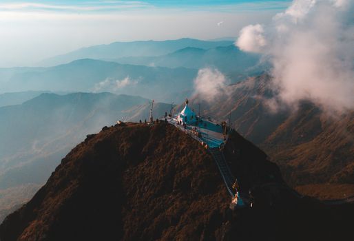 Top View Mulayit Taung golden light of the morning sun and the mist covered on Mount Mulayit,Myanmar