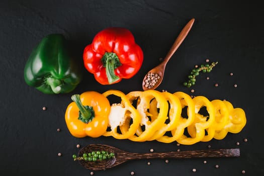 Three sweet peppers on a wooden background, Cooking vegetable salad