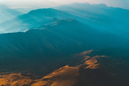 Mulayit Taung golden light of the morning sun and the mist covered on Mount Mulayit,Myanmar