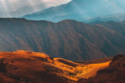 Top View Mulayit Taung golden light of the morning sun and the mist covered on Mount Mulayit,Myanmar