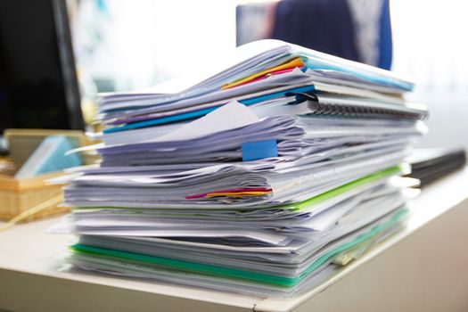 file folder and Stack of business report paper file on the table in a work office, concept document in work office