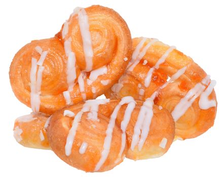 Pretzel shaped sugar cookies, made of puff pastry with butter on a white background. 