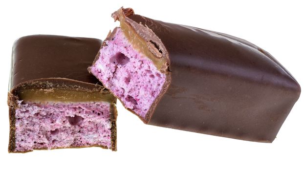 Chocolate bar with fruit berry cream filling isolated on a white background.