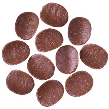 Chocolate chips top view isolated on white background.