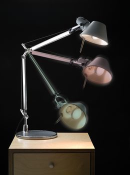 An articulated office lamp shown in various positions