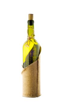 A empty bottle with a rustic jute bottle cover