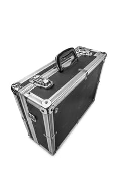 An old used aluminum photo flycase having travel several times around the world in many different countries
