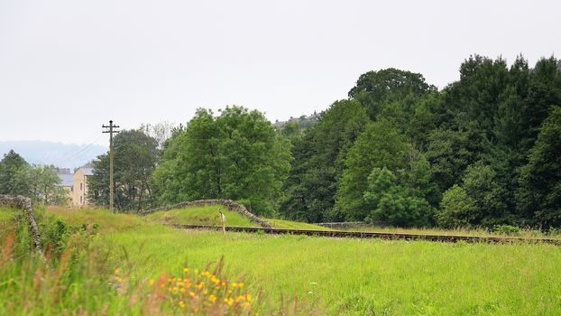 The view across the West Yorkshire countryside towards the Keighley and Worth Valley Railway in Northern England.  The railway was used in the film the Railway Children.