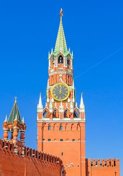 The Spasskaya Tower is the main tower with a through-passage on the eastern wall of the Moscow Kremlin, which overlooks the Red Square.