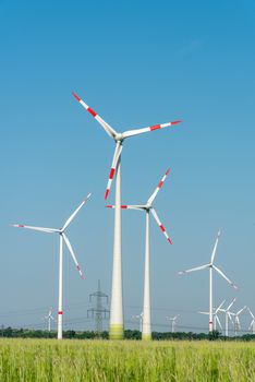 Wind energy generators in a wide open landscape in Germany