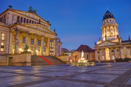 The illuminated Gendarmenmarkt in Berlin early in the morning