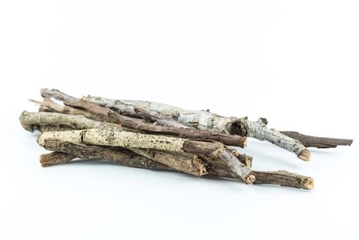 Pile of dry twigs on white background	