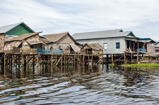 Village houses at Kampong Phluk on the Tonle Sap lake near Siem Reap, Cambodia.
