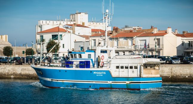 Sables d'Olonne, France - November 27, 2016: Myosotis fishing boat that enters the harbor in return for fishing on a fall day
