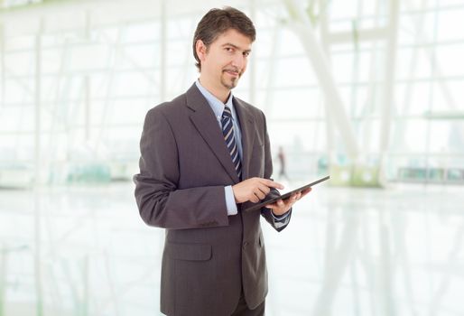 young businessman with a tablet pc, at the office