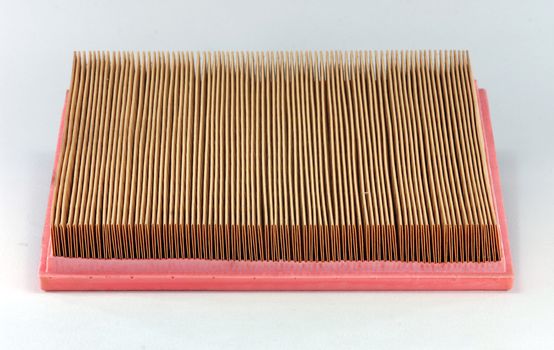 Car air filter isolated on white background