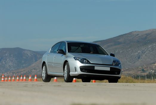 car on the test tracks with cones