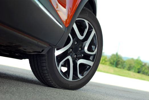 aluminium Wheel on a red sport car