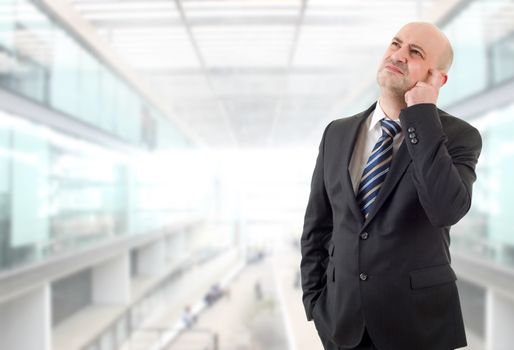 worried business man thinking, at the office