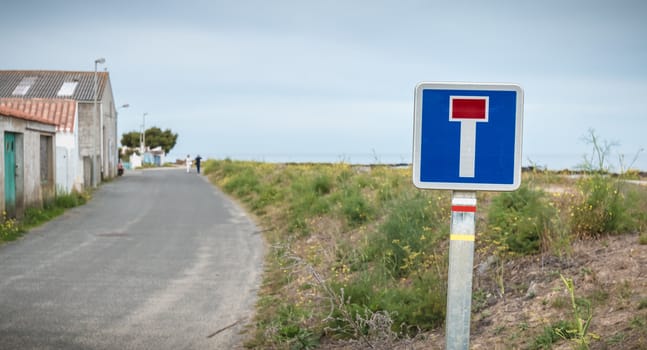 road sign indicating a dead end at the seaside on Yeu island, France
