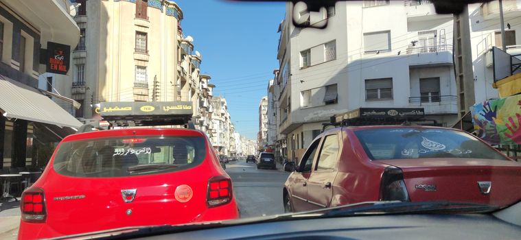red petit taxis in morocco