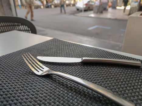 a fork and a knif in a restaurant table