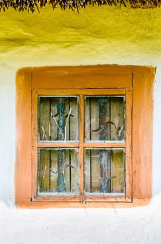 Detail of a window of a typical ukrainian antique house, in Pirogovo near Kiev