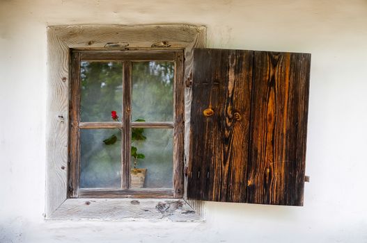 Detail of a window of a typical ukrainian antique house, in Pirogovo near Kiev