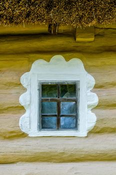 Detail of a window of a typical ukrainian antique house, in Pirogovo near Kiev