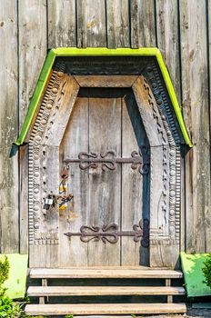 Detail of the door of a typical ukrainian antique orthodox church, in Pirogovo near Kiev