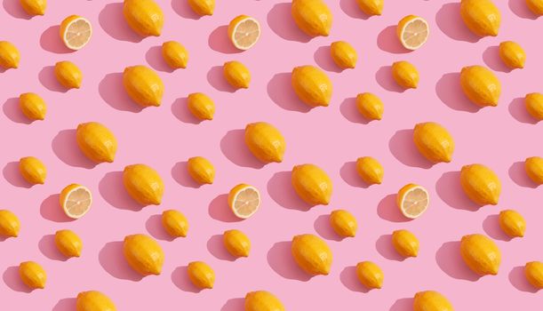 Trendy isometric Seamless continuous pattern of yellow lemons on pink background. Minimalist concept of fresh citrus fruit