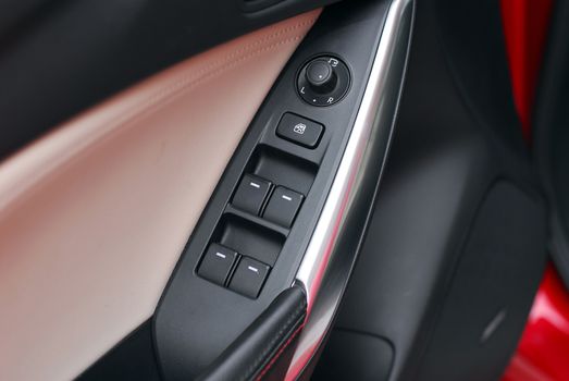 electric button for closing a car window
