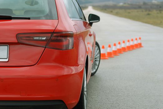 sports car on a test track with cones