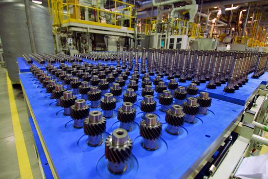 automotive transmission parts on a production line