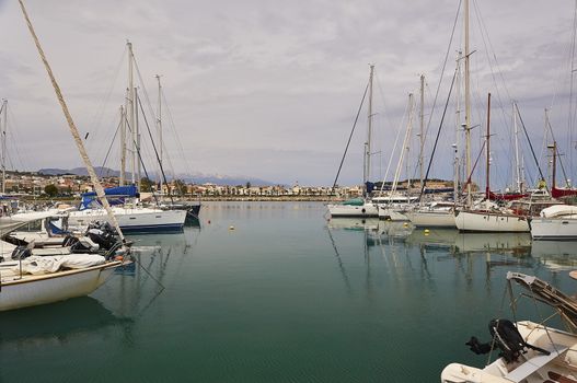 RETHYMNO, THE CRETE ISLAND, GREECE - MAY 30, 2019: The yachts in the harbour of Rethymno.