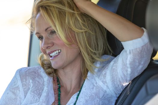 A gorgeous blonde model enjoys a spring day outdoors in the American Southwest