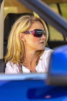 A gorgeous blonde model enjoys a spring day outdoors in the American Southwest