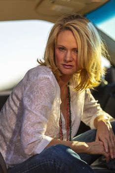 A gorgeous blonde model enjoys a spring day outdoors in the American Southwest